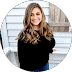 Professional portrait of a master coach in a modern office setting, showcasing confidence and expertise in personal development and leadership coaching.
